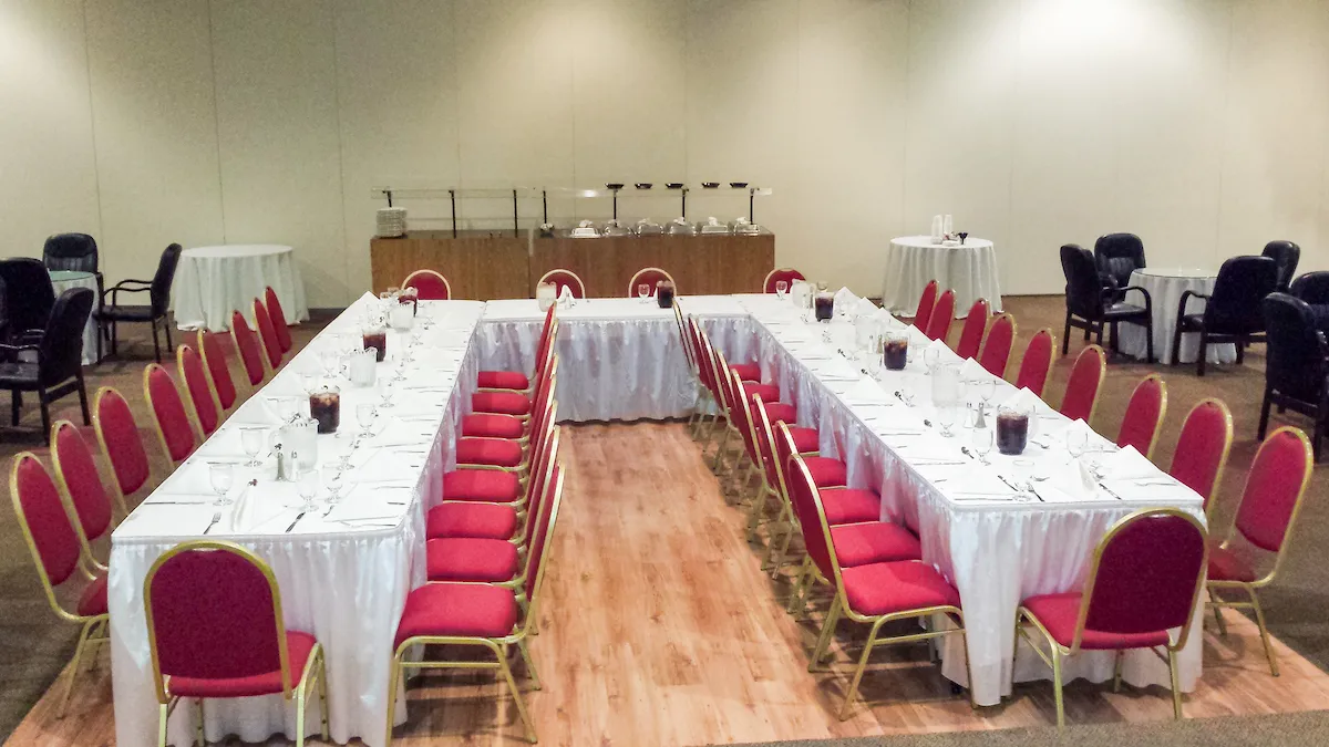 A corporate event set up in the ballroom at The Palace Center
